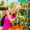 Woman Buying Plants at Garden Store