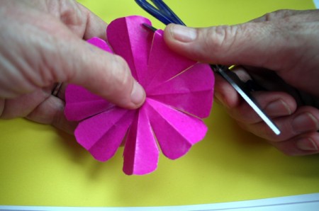 Paper Flower Decorations - curl the ends of the petals with your scissors