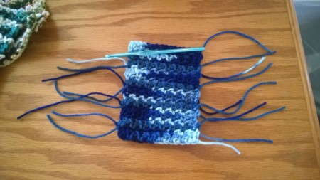 Crochet Mug Rugs - use your choice of yarn and crochet 3 more rows and change yarn, doing an odd number left me with tails on each side