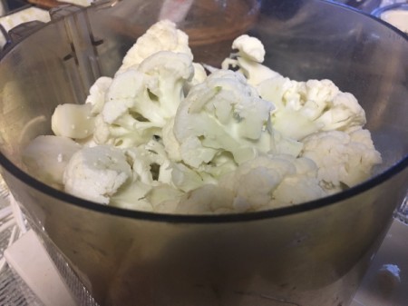 cut cauliflower in bowl