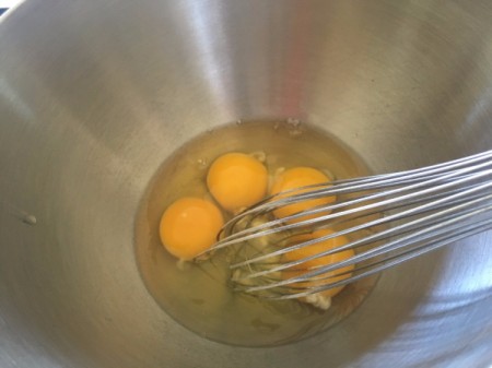 mixing eggs in bowl