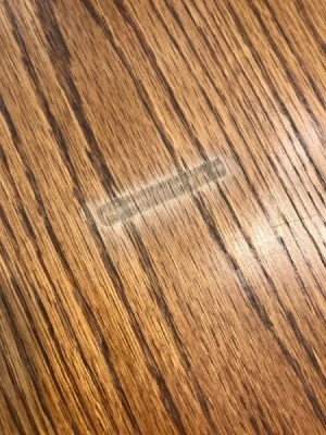 Double AA Battery Left a Burn Mark on Oak Table - mark on table