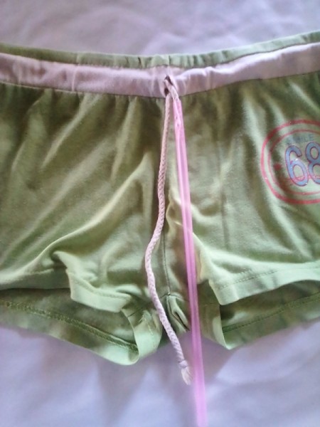 Placing a drinking straw as a channel for draw cords in clothing.