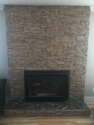 Modernizing a Brick Fireplace - light tan irregular stone/brick fireplace