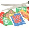 Several coupons and a pair of scissors.