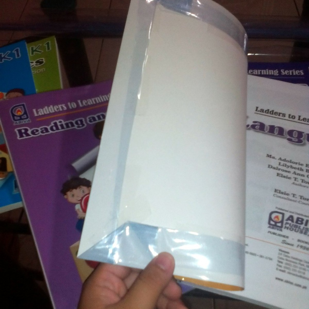 protect-books-with-plastic-cover-thriftyfun