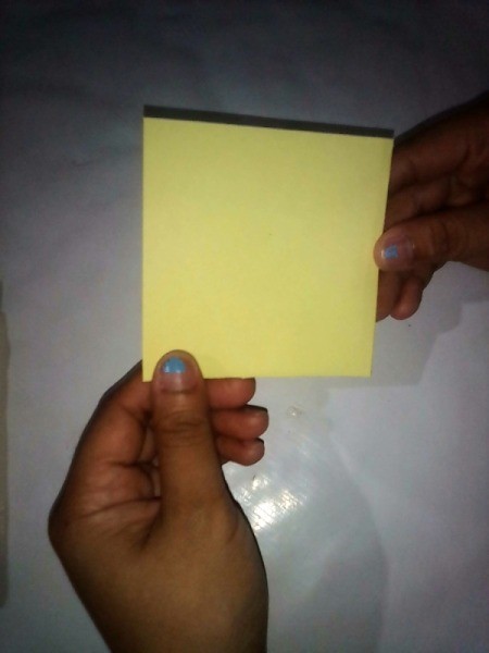 Folded Paper Puppy - square of yellow paper