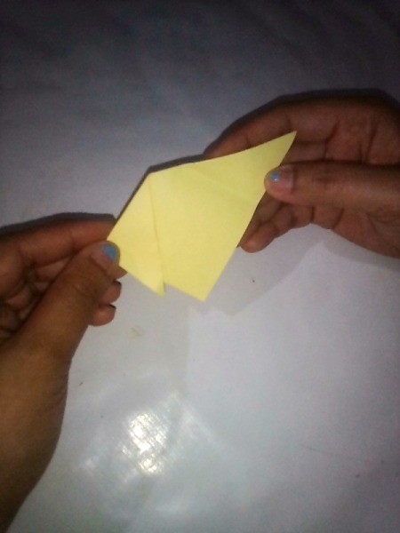 Folded Paper Puppy - with diagonal point down fold the ends to make the ears