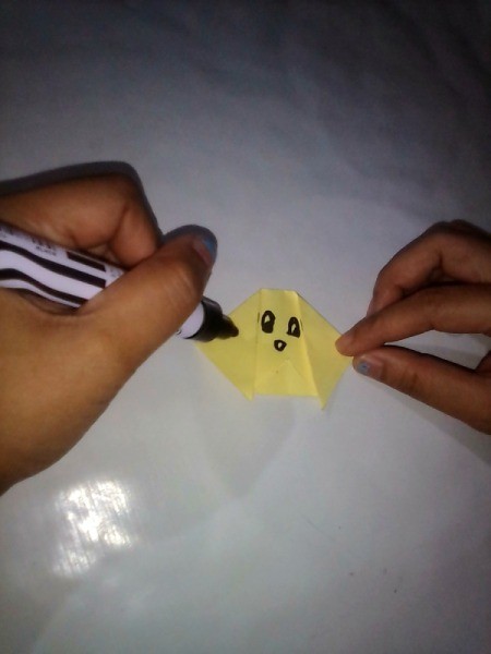 Folded Paper Puppy - adding face details with pen