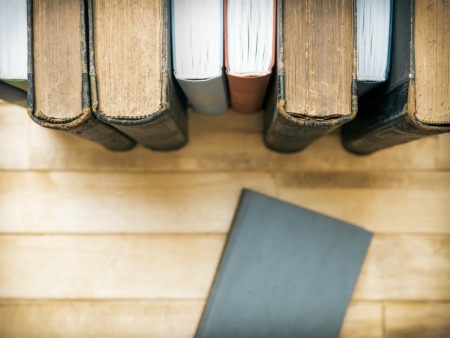 Several books on a table.