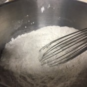 Whisking Gluten Free Flour Mix in bowl