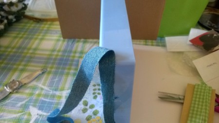 The Little Shelf Unit That Could - glue denim strip around edge and use to make a hanger at the top