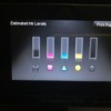 A printer showing ink levels on five cartridges.