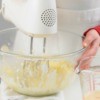 Using a mixer to make pie crust.