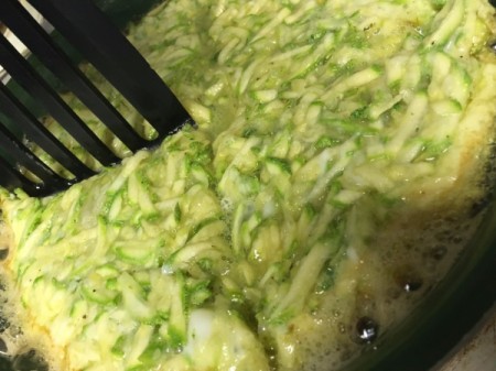 flipping the frittata in pan