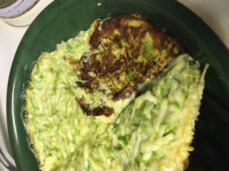 flipping the frittata in pan