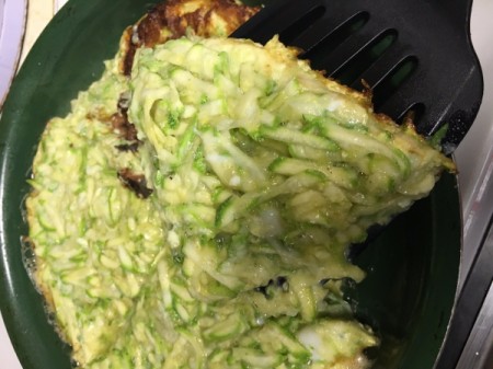 flipping the frittata in pan