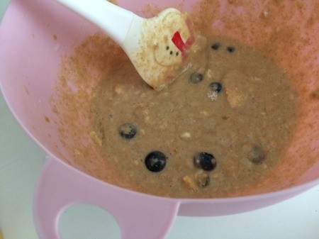 mixing wet ingredients with Blueberries