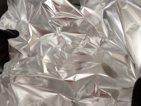 filled silicon cups covered with foil
