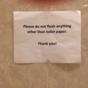 Caution on Flushable Wipes - sign warning not to flush wipes