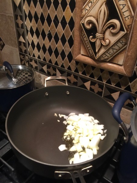 chopped onion and garlic in pan