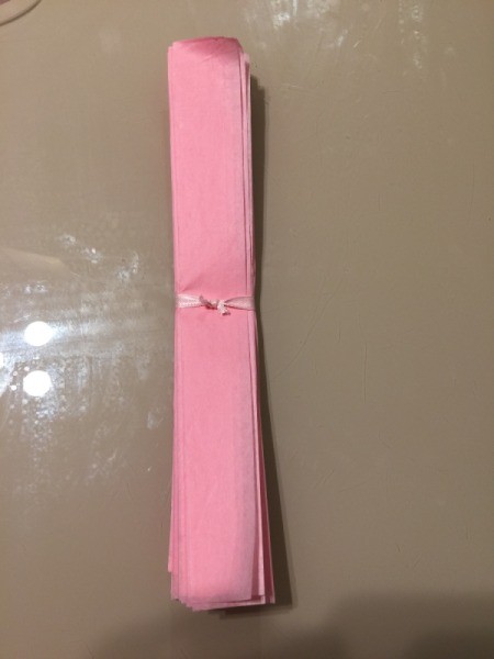 DIY Tissue Paper Pom Pom Decoration - knot