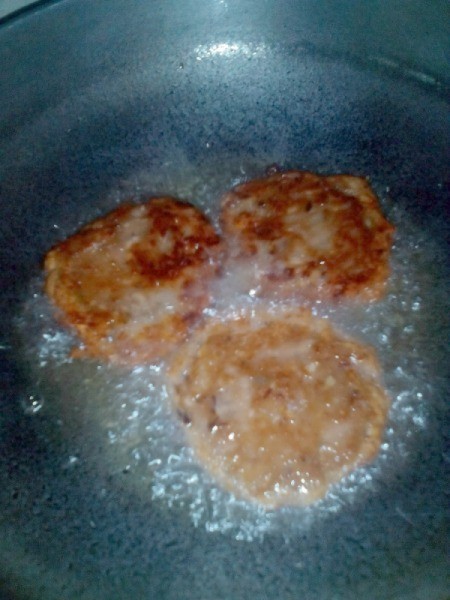 flipped Fish Patties in pan