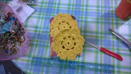 Tin Can Organizers - two doilies lying on can