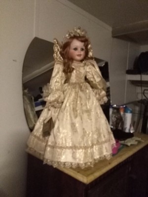 Value of Seymour Mann Porcelain Doll - angel doll