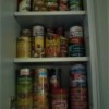 A pantry full of cans of food.
