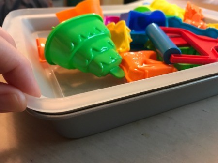 Lidded Cake Pan for Kinetic Sand - inverted lid on top of pan