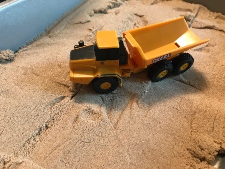 Lidded Cake Pan for Kinetic Sand - dump truck toy on sand