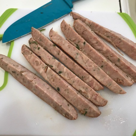 cutting sausage