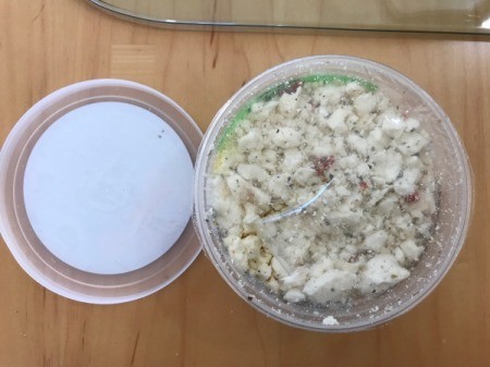 feta cheese in container