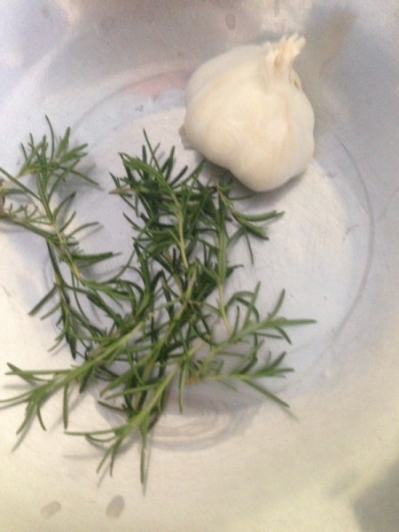 rosemary and garlic in bowl