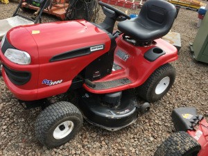 Red Craftsman riding mower.