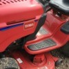 A red Toro riding mower.