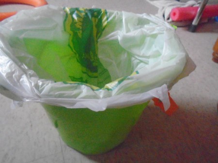 DIY Camping Toilette - place bag in bucket