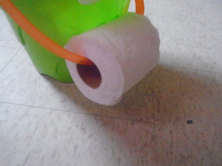 DIY Camping Toilette - attach toilet paper to bucket handle