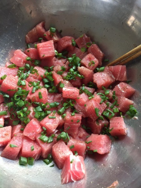 Ahi Tuna and green onion in pan