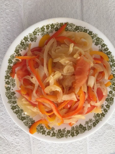 onions, peppers and tomatoes in bowl