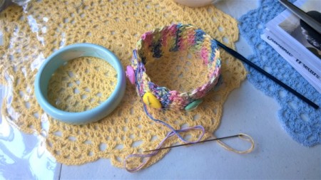 Crochet Covered Bangle - bangle next to crochet strip