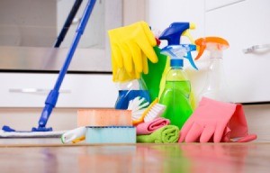 A professional cleaner's cleaning supplies.