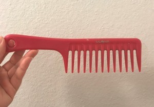 Use a Wide Toothed Comb Instead of a Brush - red comb