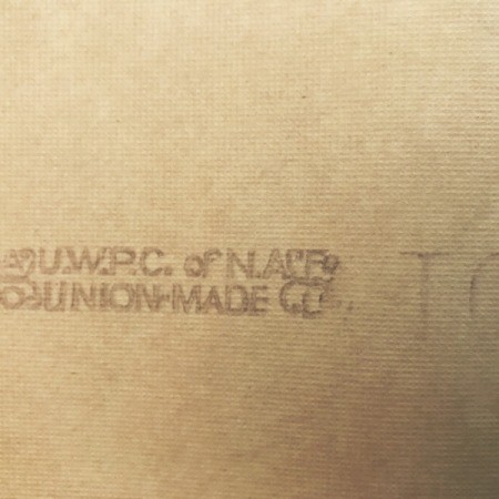 The back marking on a roll of wallpaper.