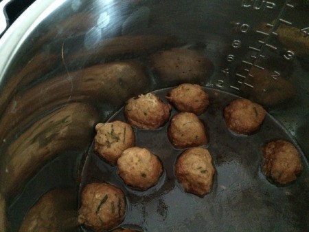 Meatballs in pan with sauce