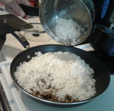 rice added to mushrooms
