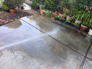 Wet Concrete to Stay Cool - spraying water on patio