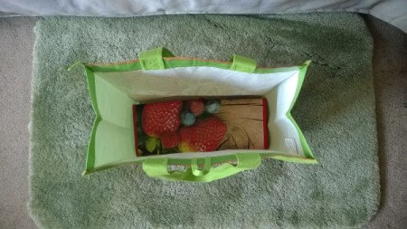 Two Shopping Bags in One - one folded and placed down inside the open one
