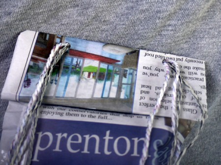 Newspaper Gift Bag - thread cord or ribbon through holes